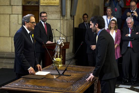 Jordi Puigneró, prometent el càrrec davant del president Torra FOTO: ACN