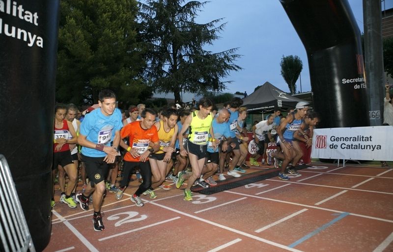 Sortida de la primera Cursa Popular Nocturna Moonrace, al CAR de Sant Cugat. FOTO: Artur Ribera