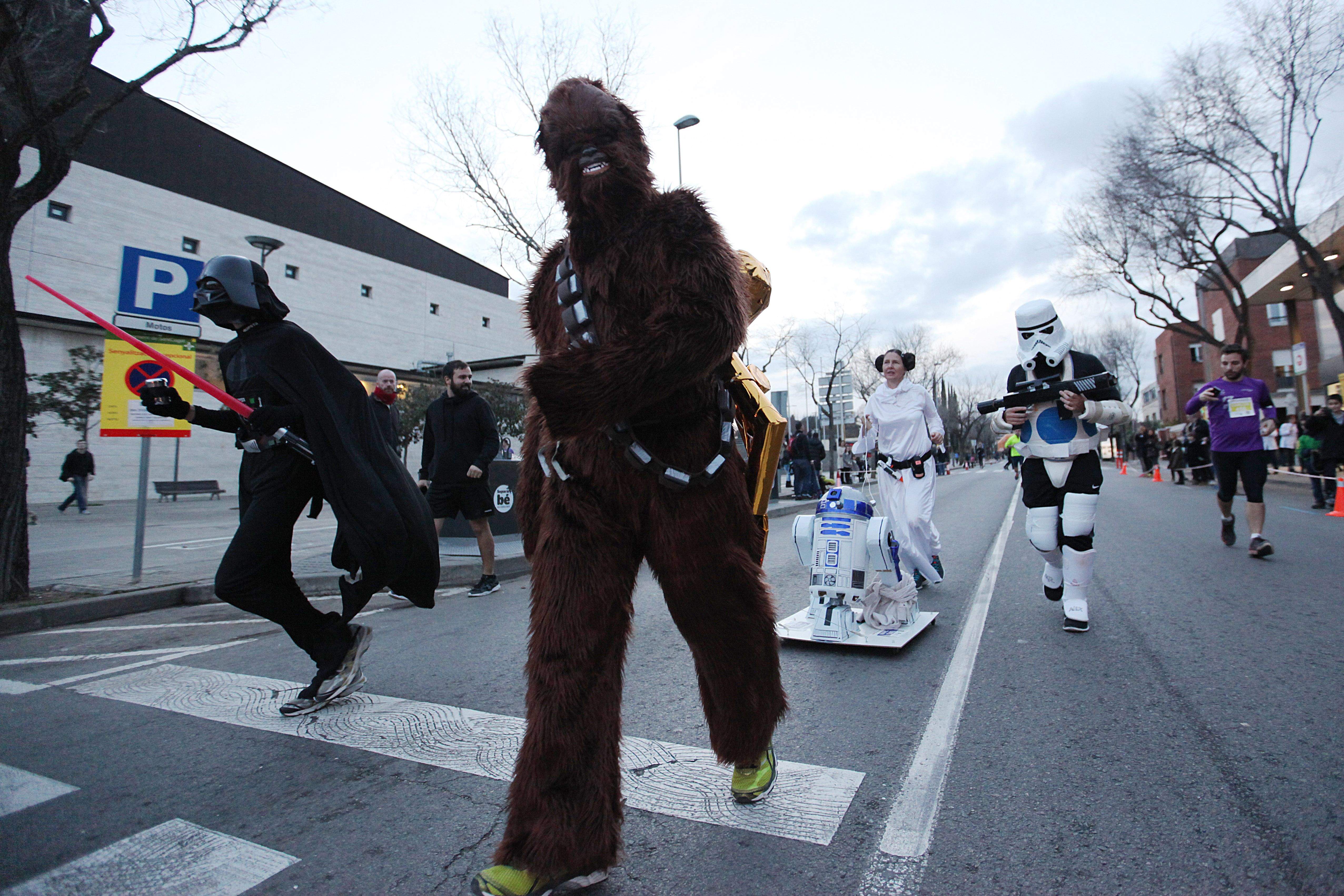 Aquests quatre atletes són els vencedors de la disfressa col·lectiva. FOTO: Lali Puig