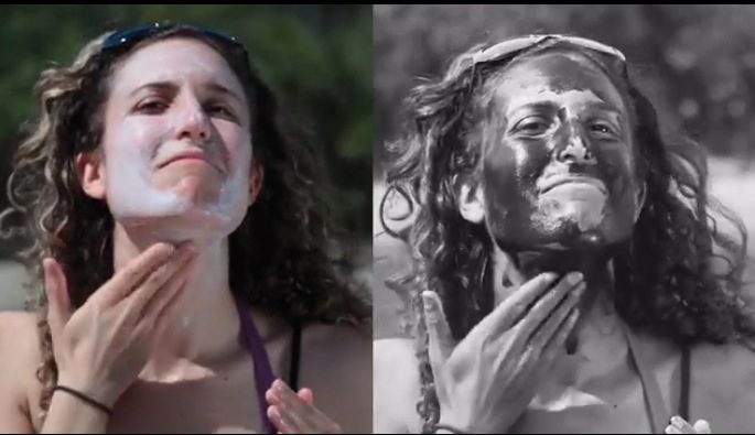 El dispositiu mostra les zones on hi ha crema solar de color negre