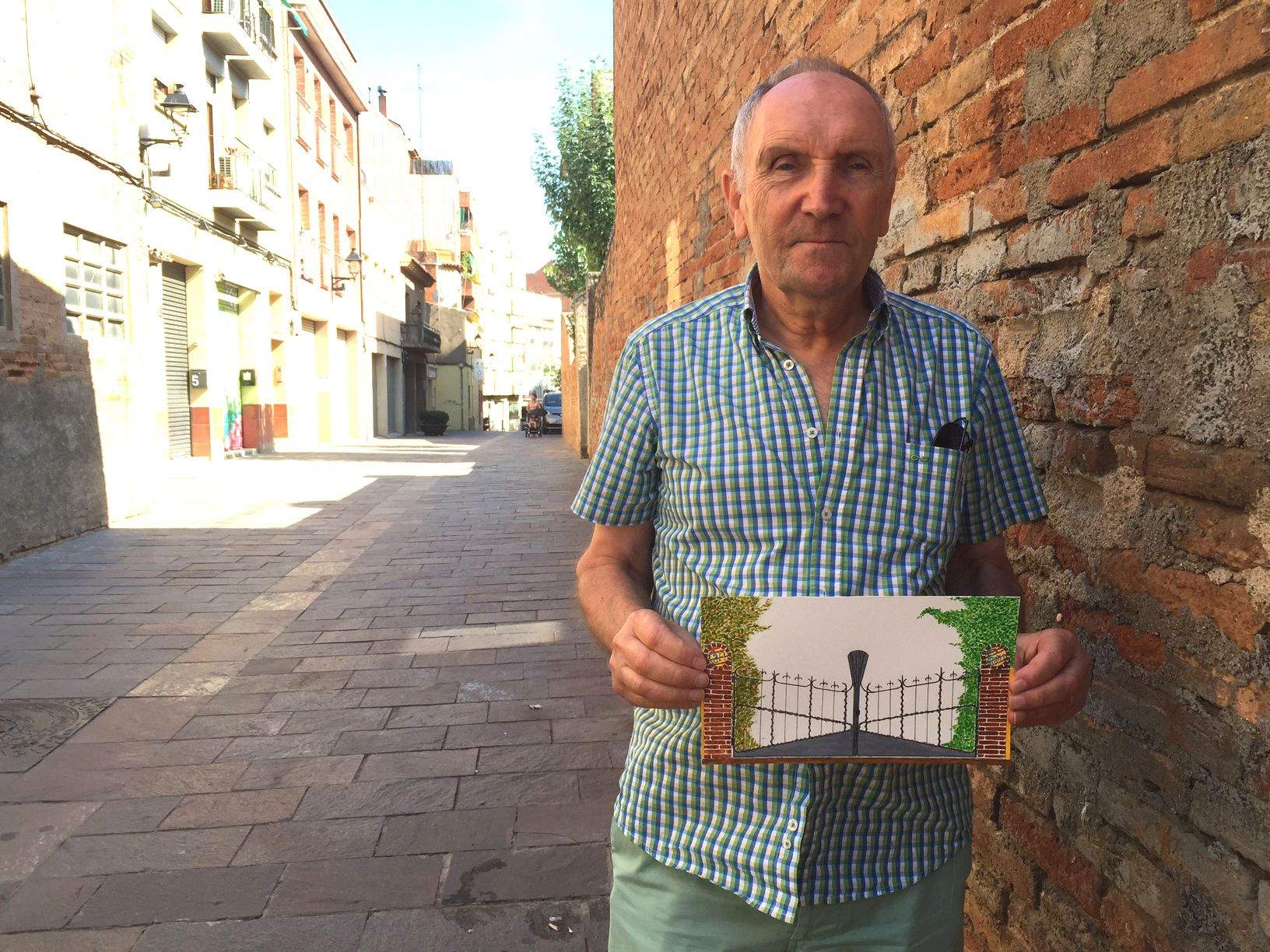 Pere Serra, amb una de les seves aquarel·les FOTO: Pere Fernández