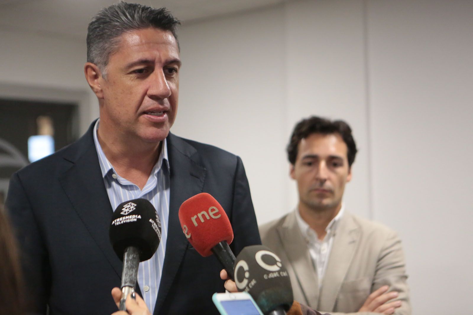 Xavier Garcia Albiol i Álvaro Benejam, a la nova seu del PP FOTO: Artur Ribera