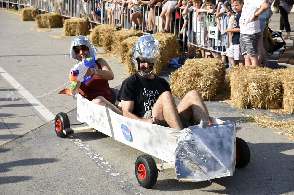Llitboard: baixada de carros de Festa Major. Foto: Bernat Millet.
