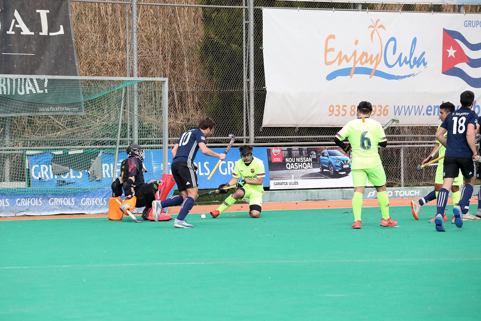 Hoquei sobre herba masculí. Junior FC-FC Barcelona. Foto: Lali Álvarez