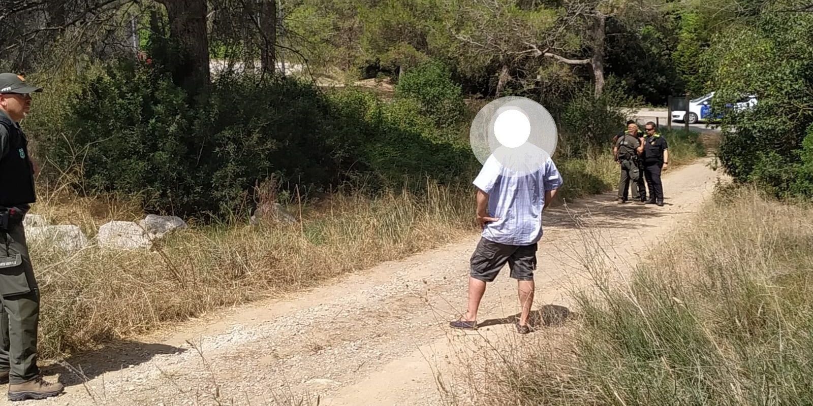 Moment de la detenció del pressumpte incendiari. FOTO: Cedida