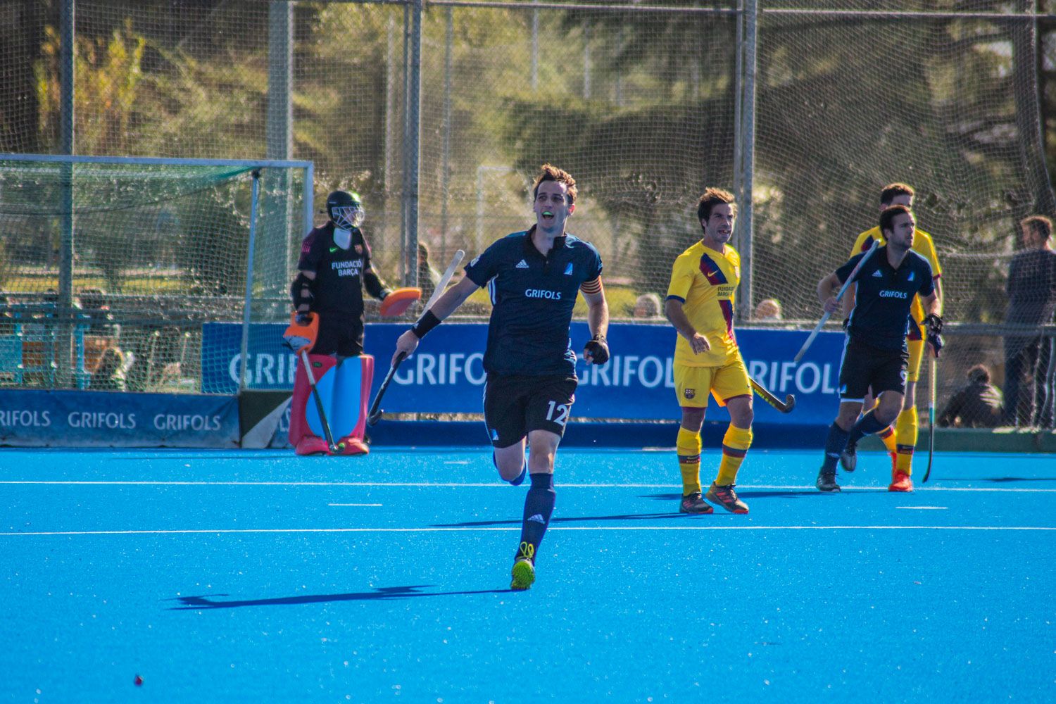 Hoquei sobre herba masculí. Partit de lliga. Junior FC-FC Barcelona. Foto: Adrián Gómez
