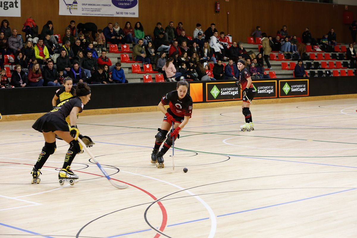 Acció del partit entre PHC Sant Cugat i Generali HC Palau de Plegamans. FOTO: Yves Dimant. 