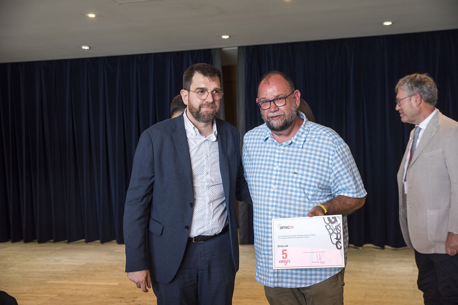 Entrega de diplomes pel 25è aniversari de l'AMIC. FOTO: Bernat Millet.