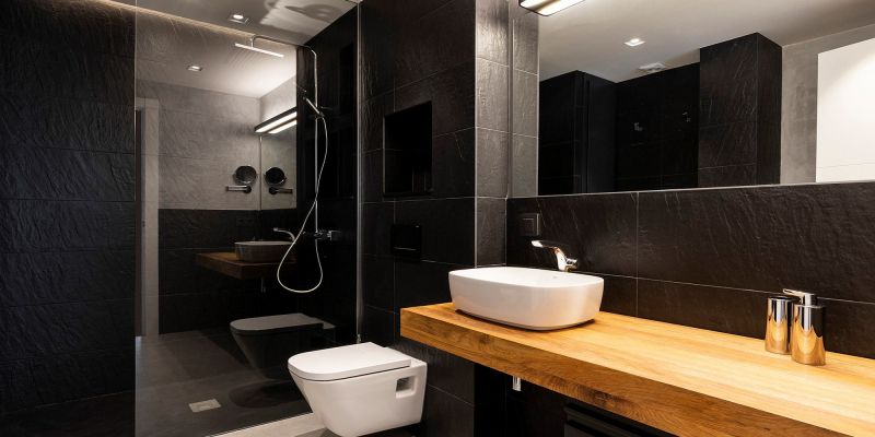  El lavabo negre combina a la perfecció amb el blanc i altres materials naturals com la fusta FOTO: Cedida