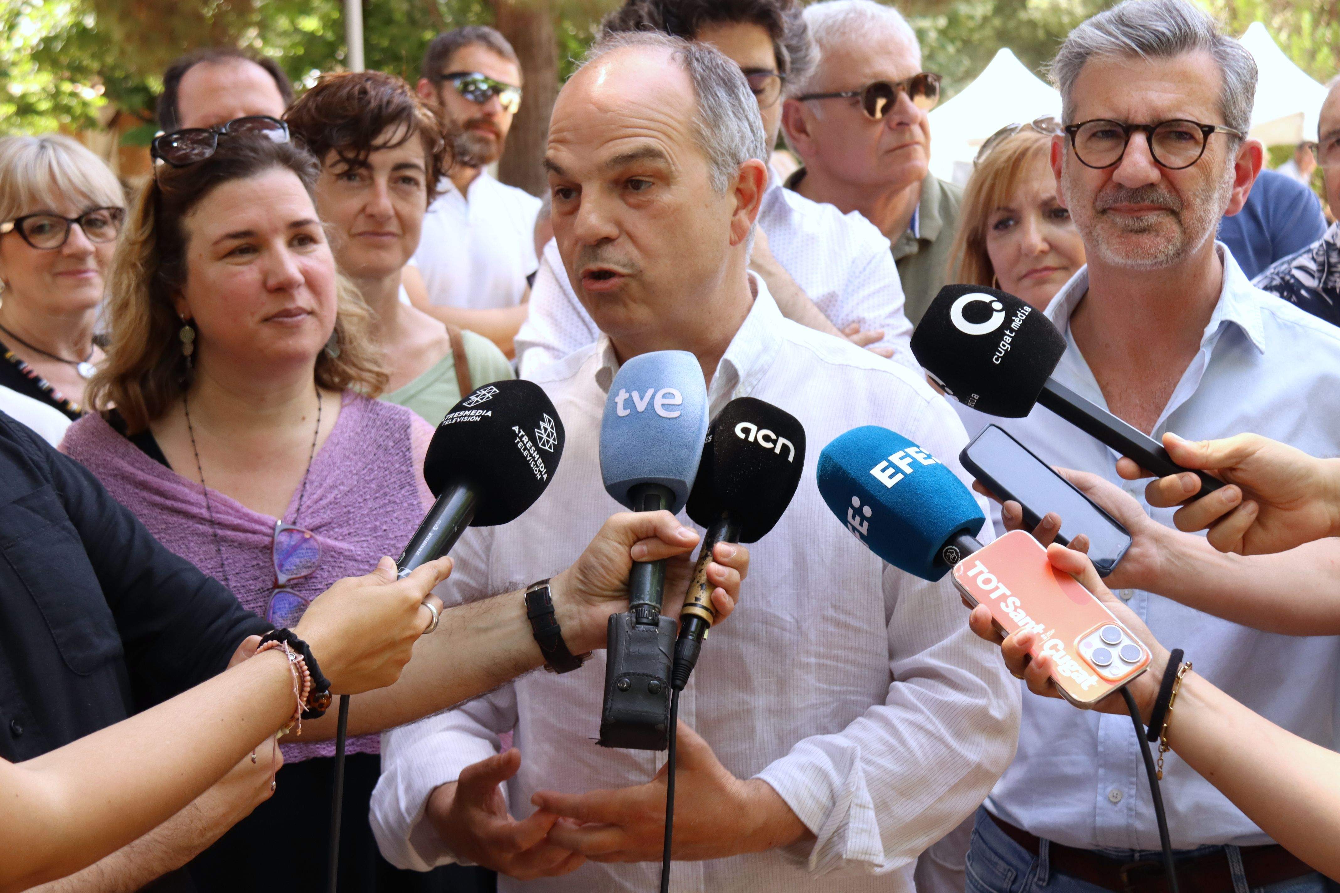 Jordi Turull i Josep Maria Vallès a l'aplec de Junts. FOTO: ACN